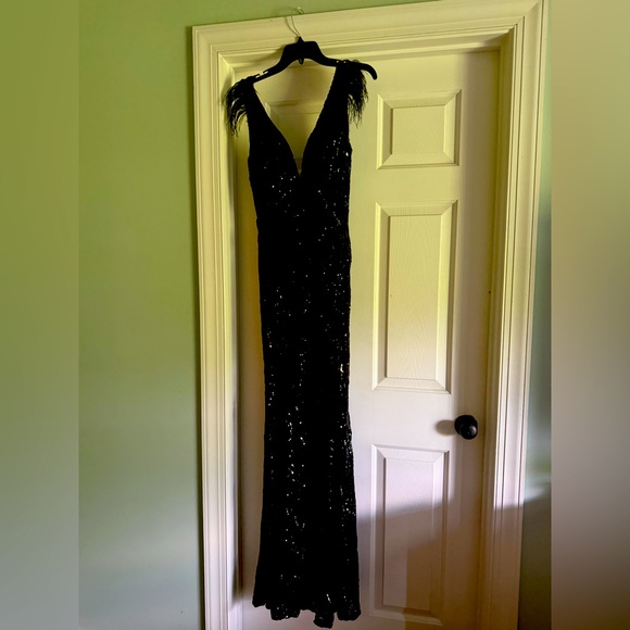 Windsor Dresses & Skirts - Black sequins dress with fur on the sleeve. Only worn once